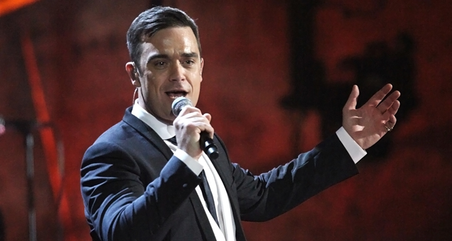 una delle immagini di un concerto di robbie williams